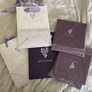 YOUNIQUE gift bags and boxes